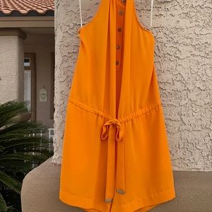 Romper NWOT Rachel Rachel Roy Orange Size 0 perfect condition. 100% Polyester